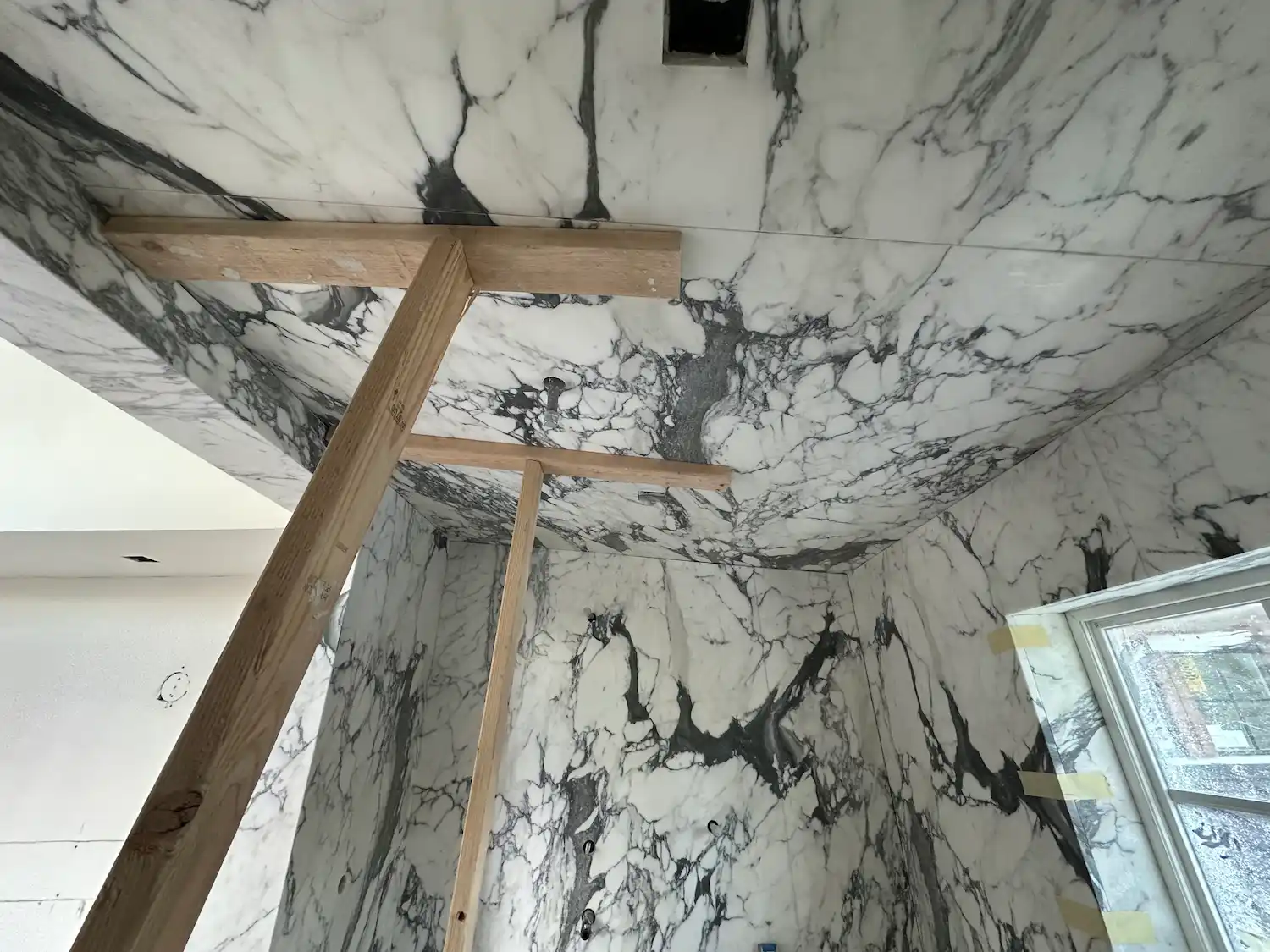 Full room marble wall and ceiling installation